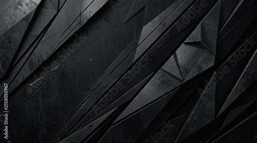 A dark, abstract pattern of fragmented, overlapping shapes dominates the image.