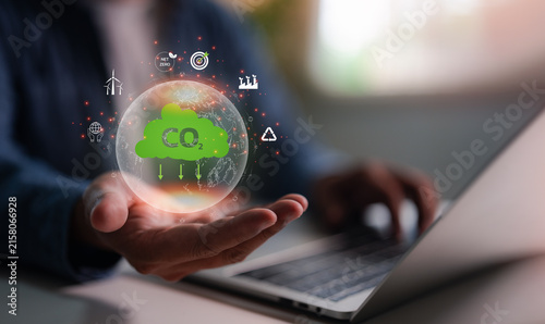 Global warming from climate change concept, Globe with CO2 reducing with virtual carbon credit to limit global warming climate change. World for decrease carbon dioxide emission, carbon footprint.