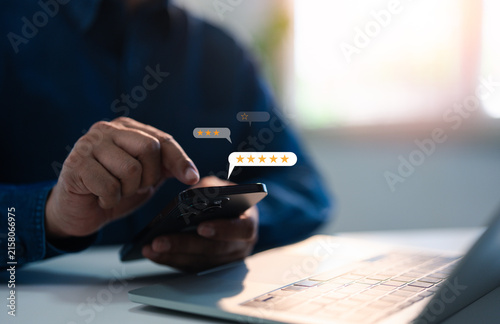 Customer review satisfaction feedback survey concepts. User give rating to service experience on online application, Evaluate quality of service leading to reputation ranking of business.