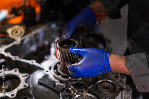 car mechanic repairing a car