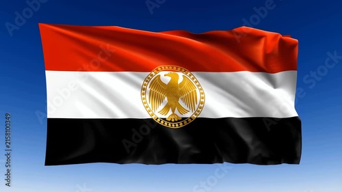 Egyptian National Flag Waving Proudly Against Clear Blue Sky