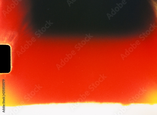 Abstract film light leak with red burn effect