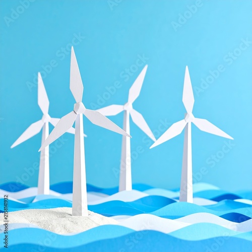 three wind turbines in the ocean