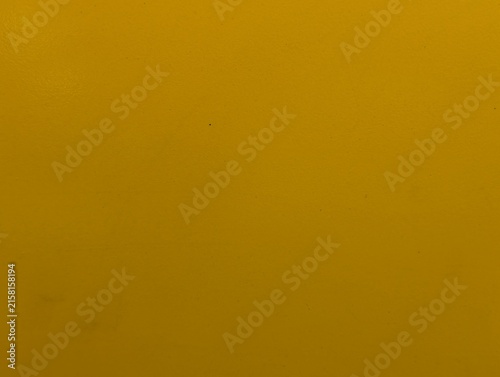 Solid mustard yellow paper background texture