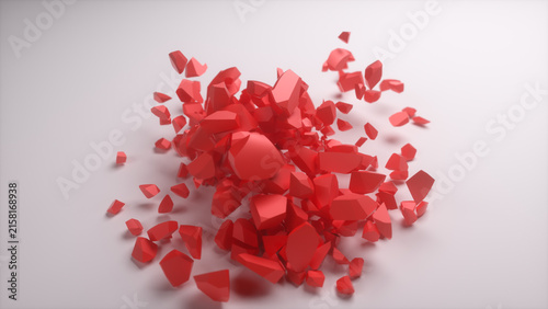 Red geometric fragments scattered across a light gray surface