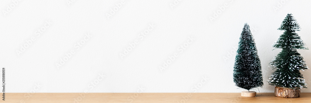 Fototapeta premium Mini Christmas trees white banner background