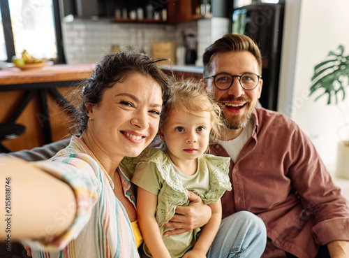 Photography Happy family taking selfie together at home