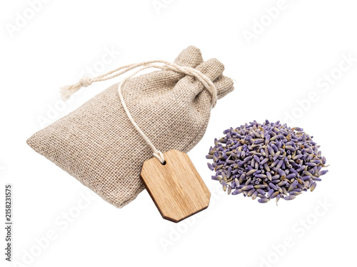 Dried lavender sachet bag pouch with wooden tag for home fragrance aromatherapy concept, isolated on black background for organic wellness, spa product mockup, herbal bath relaxation and scent packagi