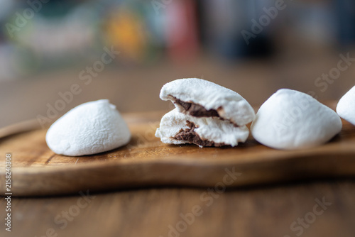Close-up of chocolate covered marshmallow with soft texture