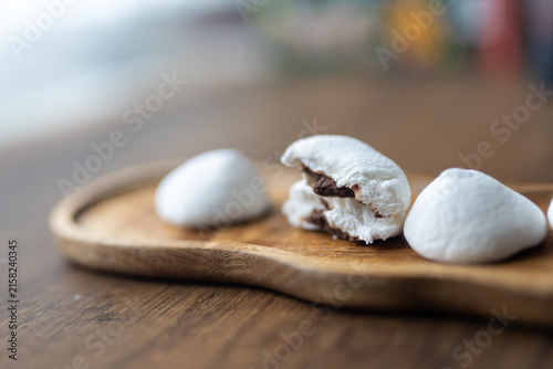 Close-up of chocolate covered marshmallow with soft texture