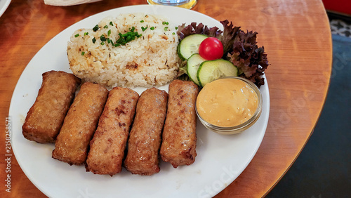 Cevapcici or Cevapi grilled sausages and rice pilaf