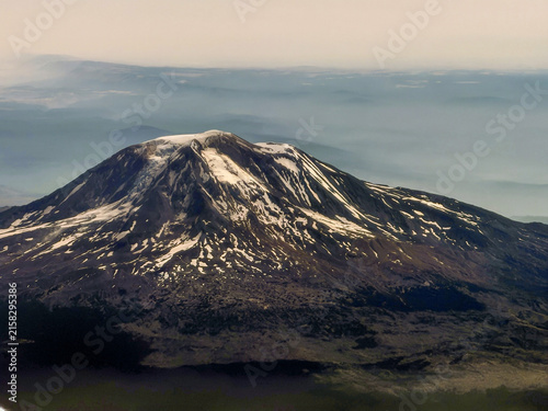Aerial View of Mount St. Helens Volcano Peak from Airplane Window, Washington State