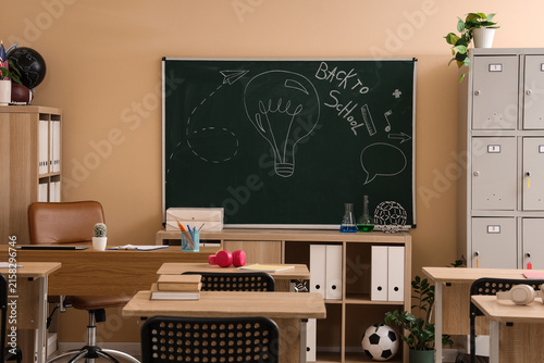 Empty classroom with a blac...