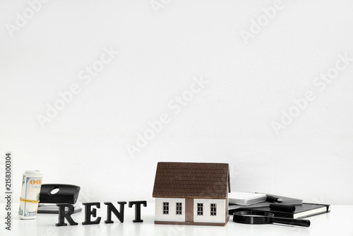 Toy house with notebooks, m...