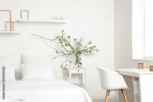 Vase with blooming branches...