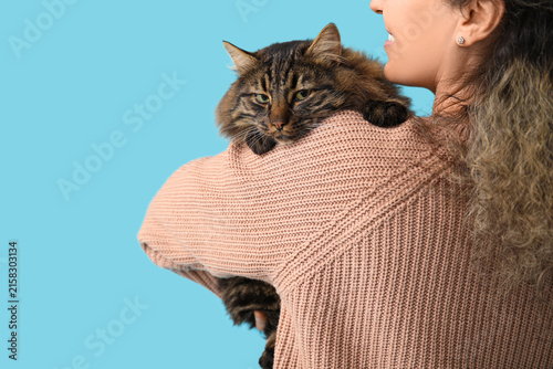 Mature woman with cute cat ...