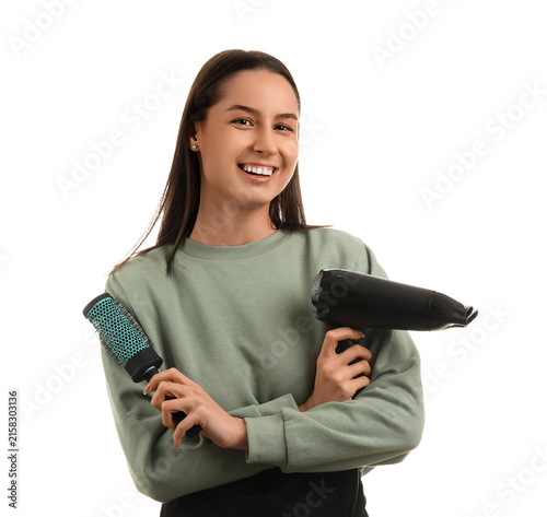 Female hairdresser with dry...