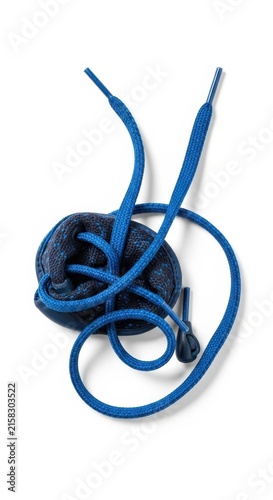 Blue shoelaces tied in a decorative bow on white background.