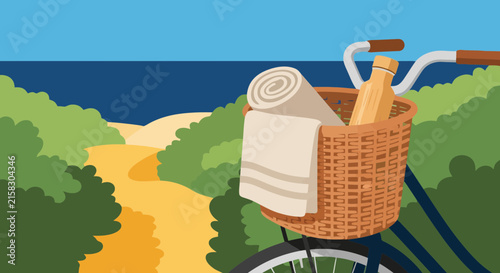 Bicycle basket packed with towel and water bottle parked by coastal path