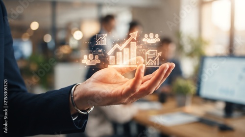 Business growth and financial success strategy concept with glowing chart graphics on businessman hand