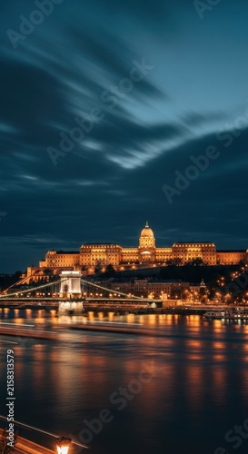 Budapest Castle Hill Illuminated at Night by River.