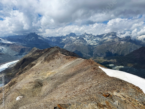Picturesque mountain peaks above the Alpine valley of Mattertal and the tourist resort of Zermatt in Switzerland - Malerische Berggipfel über dem Alpental Mattertal und dem Ferienort Zermatt, Schweiz