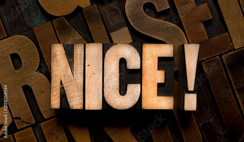 фотографія Nice exclamation word created using vintage wooden letterpress printing type