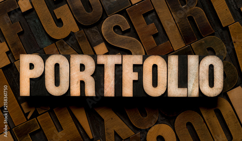 Принти на полотні Portfolio word spelled out in vintage wooden letterpress type blocks