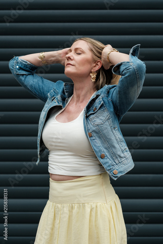 Photography Woman enjoying urban light moment feeling serene