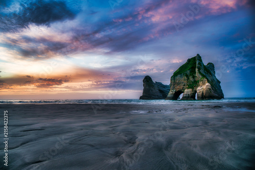 Dusk skies over Puponga  Wharariki sandy beach in Nelson