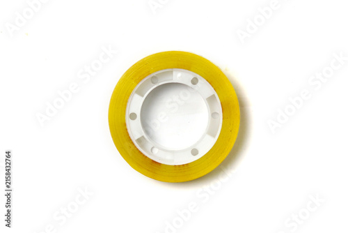 Top view of a clear adhesive tape roll with a white plastic core, isolated on a clean white background