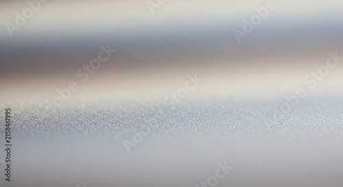 Abstract smooth metallic gradient surface with soft focus blur and clean architectural lines for modern commercial background design