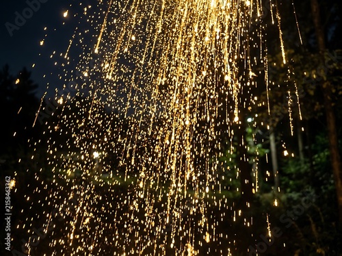 Golden glittery bokeh light background texture.