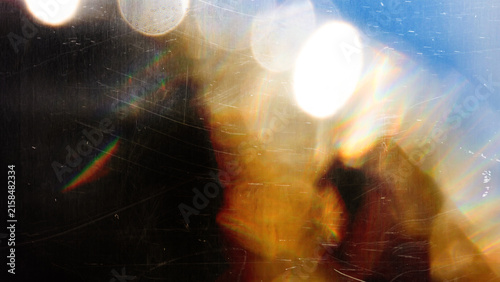 light leak overlay effect with scratch dust and blur light leaks, retro grain noisy film distressed texture light leak flare on black background, grunge dirty distressed blurry light background
