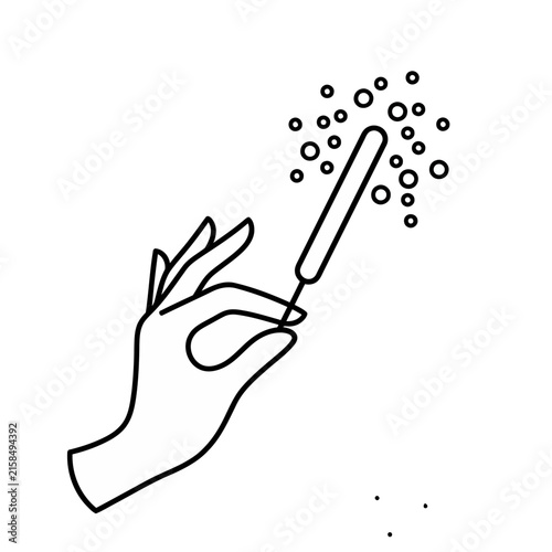 Hand holding a sparkler with sparks