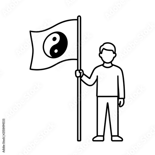 Person holding a flag with yin and yang symbol