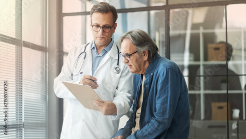 Talking to a patient during a consultation