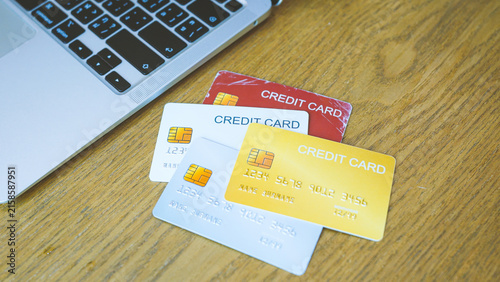 E-commerce payment choices, Multiple credit cards assortment on desk for digital banking and checkout.