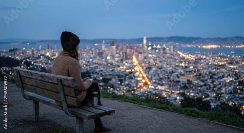 Woman on Bench Gazing at City Lights Evening View