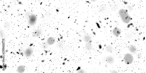 Dark dust particles and grit scattered across a transparent background, creating a grunge overlay texture for a vintage, dirty, or damaged effect