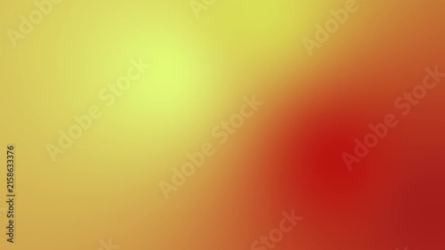 Seamless looping motion graphic of a smooth gradient slowly shifting between yellow, orange and red, creating a warm sunlit out of focus abstract backdrop.