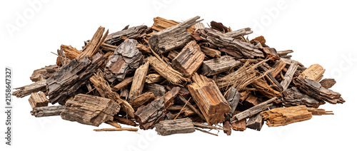 Wood chips mulch pile bark heap isolated on black background for garden landscaping, organic timber shavings, dry splintered tree pieces, rustic firewood fuel, biomass material texture detail