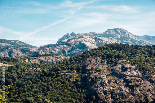 Breathtaking landscape of rocks and forest in the mountains of Corsica