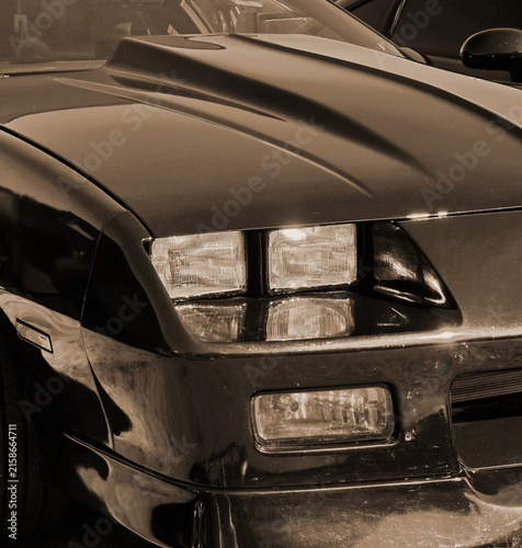 Classic Sports Car Front With Hood Scoop And Headlights