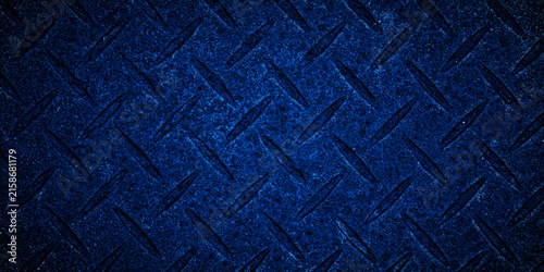 Blue diamond plate metal texture background with grunge industrial surface and raised tread pattern. Useful for construction, safety, factory, wallpaper, and design projects.