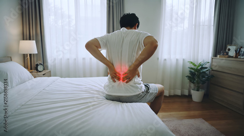Man Suffering from Lower Back Pain at Home