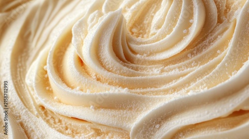 close-up of creamy piped vanilla frosting swirls dusted with fine powdered sugar, smooth indulgent and inviting texture