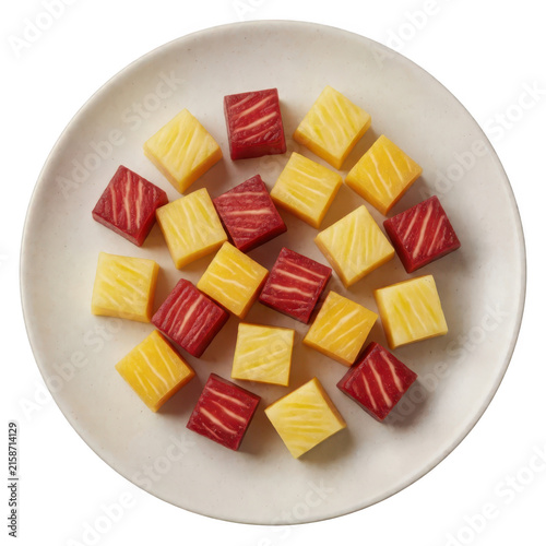 Red and Yellow Fruit Cubes on Plate