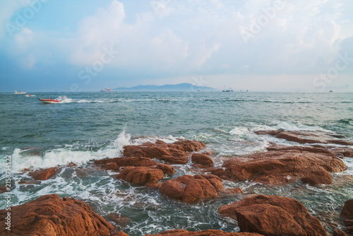 The natural beauty of reefs, beaches, and waves along the coast of Qingdao, China