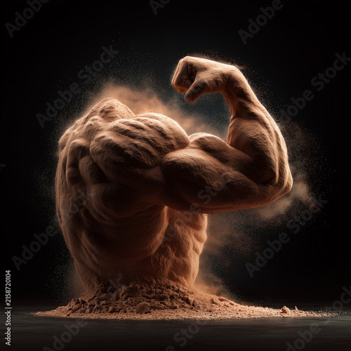 Protein powder forming the abstract shape of muscular dust shaped figure in side chest pose on a dark backdrop